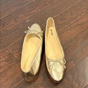 Anthropologie Maeve Metallic Gold Loafers with Bow
Anthropologie